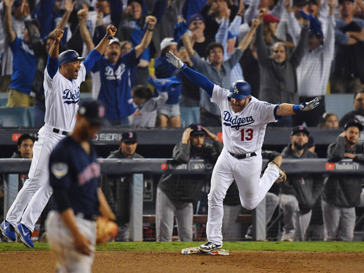 Max Muncy celebrates after hitting a home run