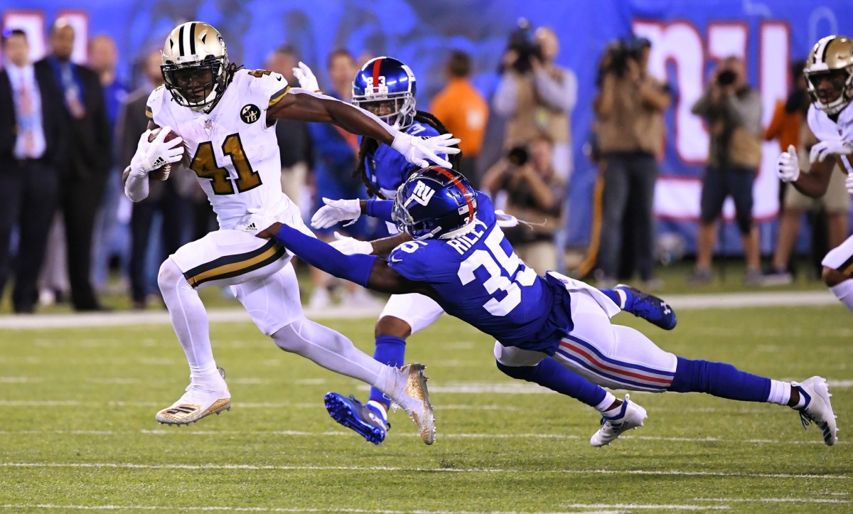 New Orleans Saints running back Alvin Kamara (41) runs for a touchdown against the Giants. Mandatory Credit: Robert Deutsch-USA TODAY 