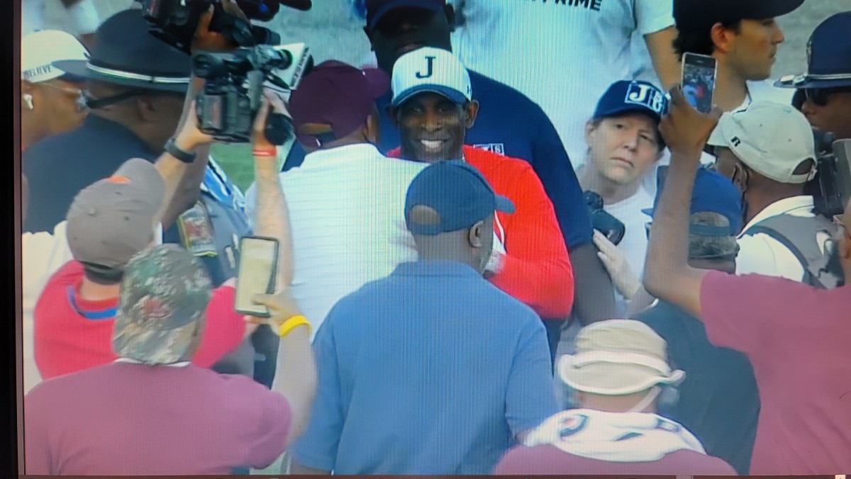 Deion Sanders and Connell Maynor Embrace