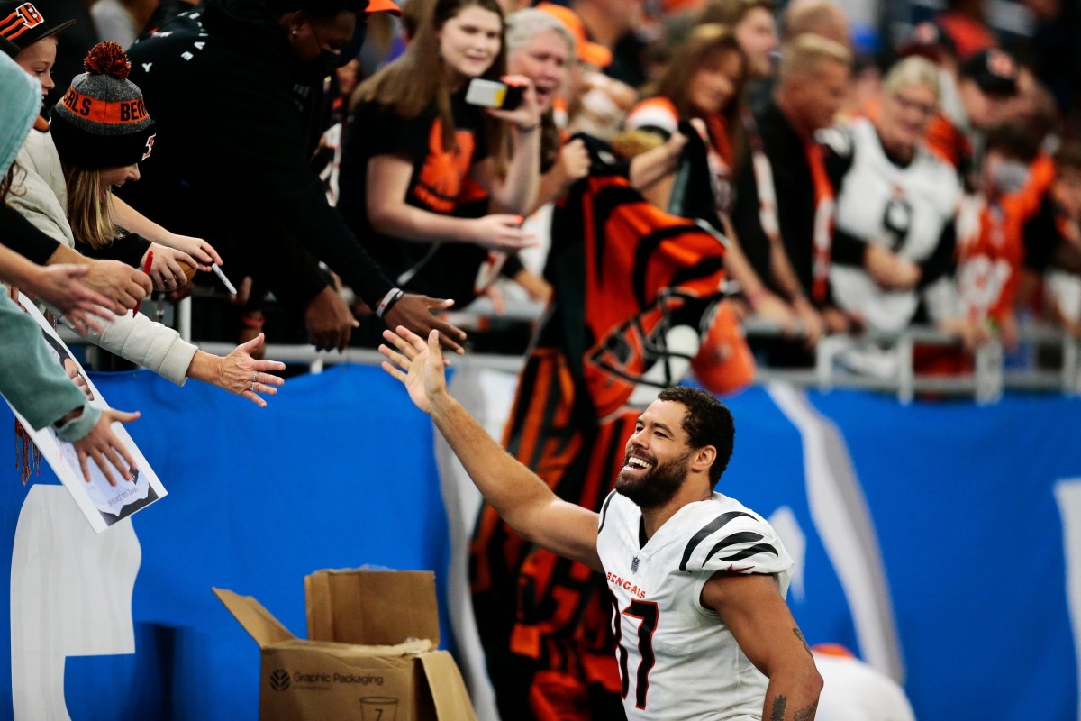 Fan Drops Phone During C.J. Uzomah's TD Celebration, Joe Mixon Saves ...