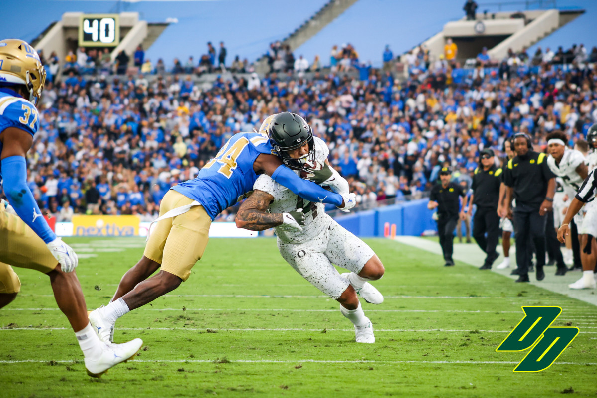 Pittman fights through a tackle after the catch against UCLA.
