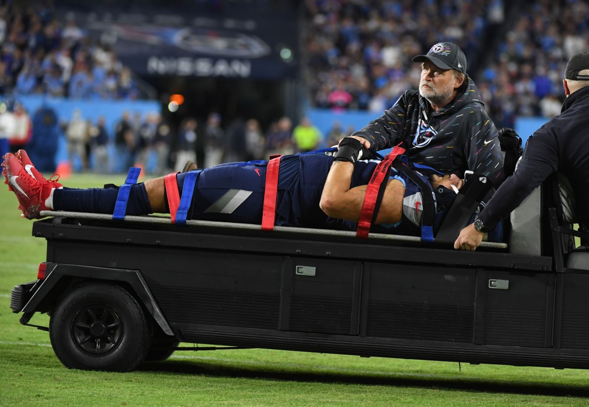 Titans left tackle Taylor Lewan carted off field with injury