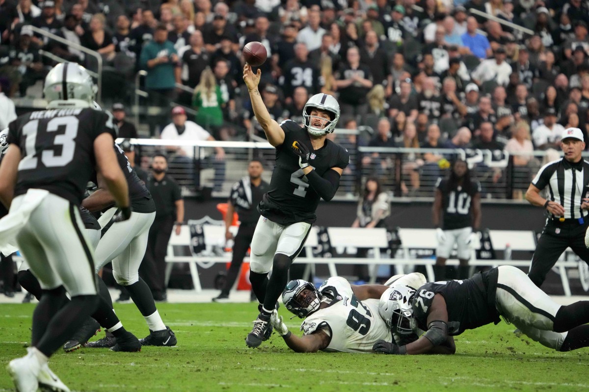 Oakland, California, USA. 9th Oct, 2016. Oakland Raiders quarterback Derek  Carr (4) and wide receiver Amari Cooper (89) celebrate touchdown on Sunday,  October 9, 2016, at O.co Coliseum in Oakland, California. The