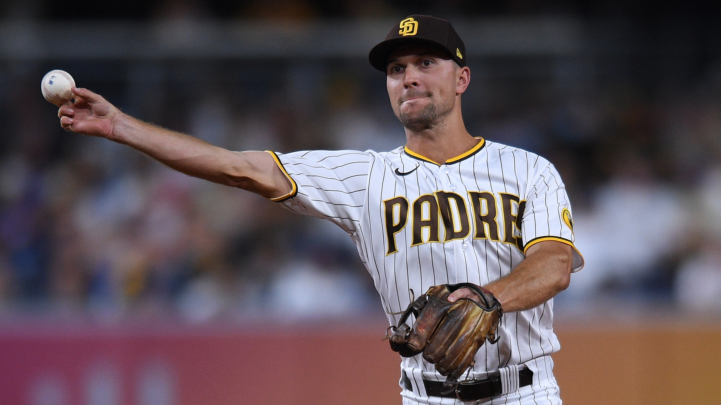 Padres trade Adam Frazier for pair of prospects