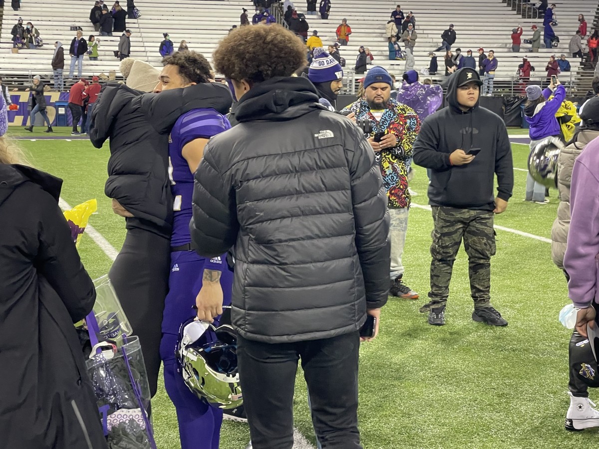 Cornerback Trent McDuffie shares a hug in what might have been his final game.