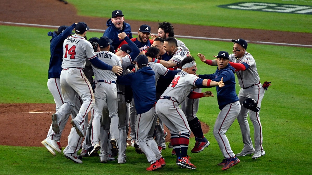 Atlanta Braves Unsigned 2021 MLB World Series Champions Team Dogpile Photograph