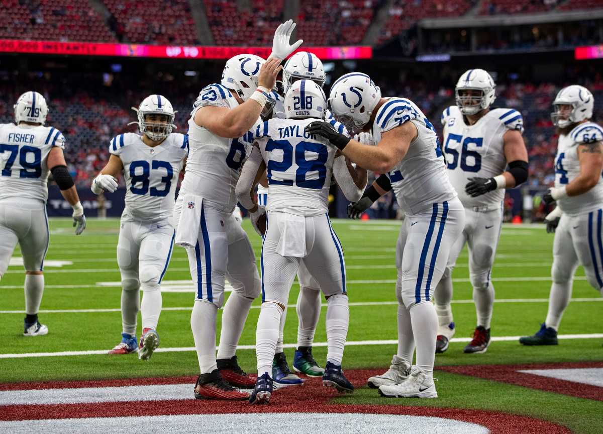 Indianapolis Colts' Ashton Dulin (16) celebrates a touchdown reception  during the first half of …