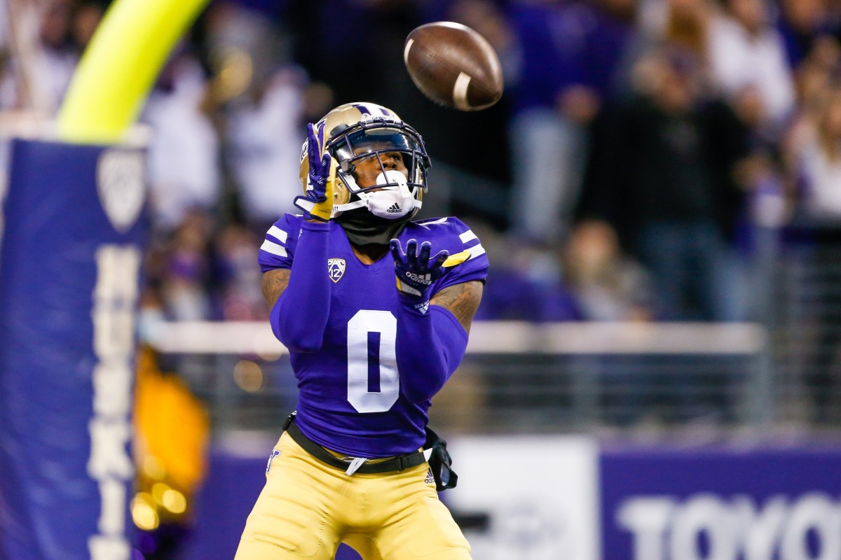 Giles Jackson gathers in a kickoff.