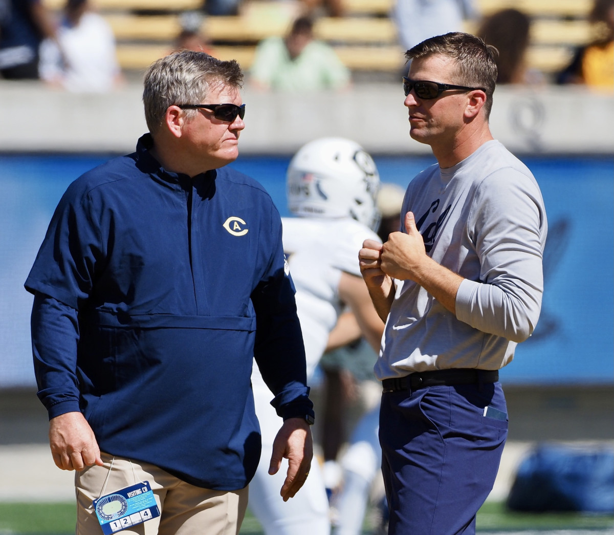 Dan Hawkins and Justin Wilcox