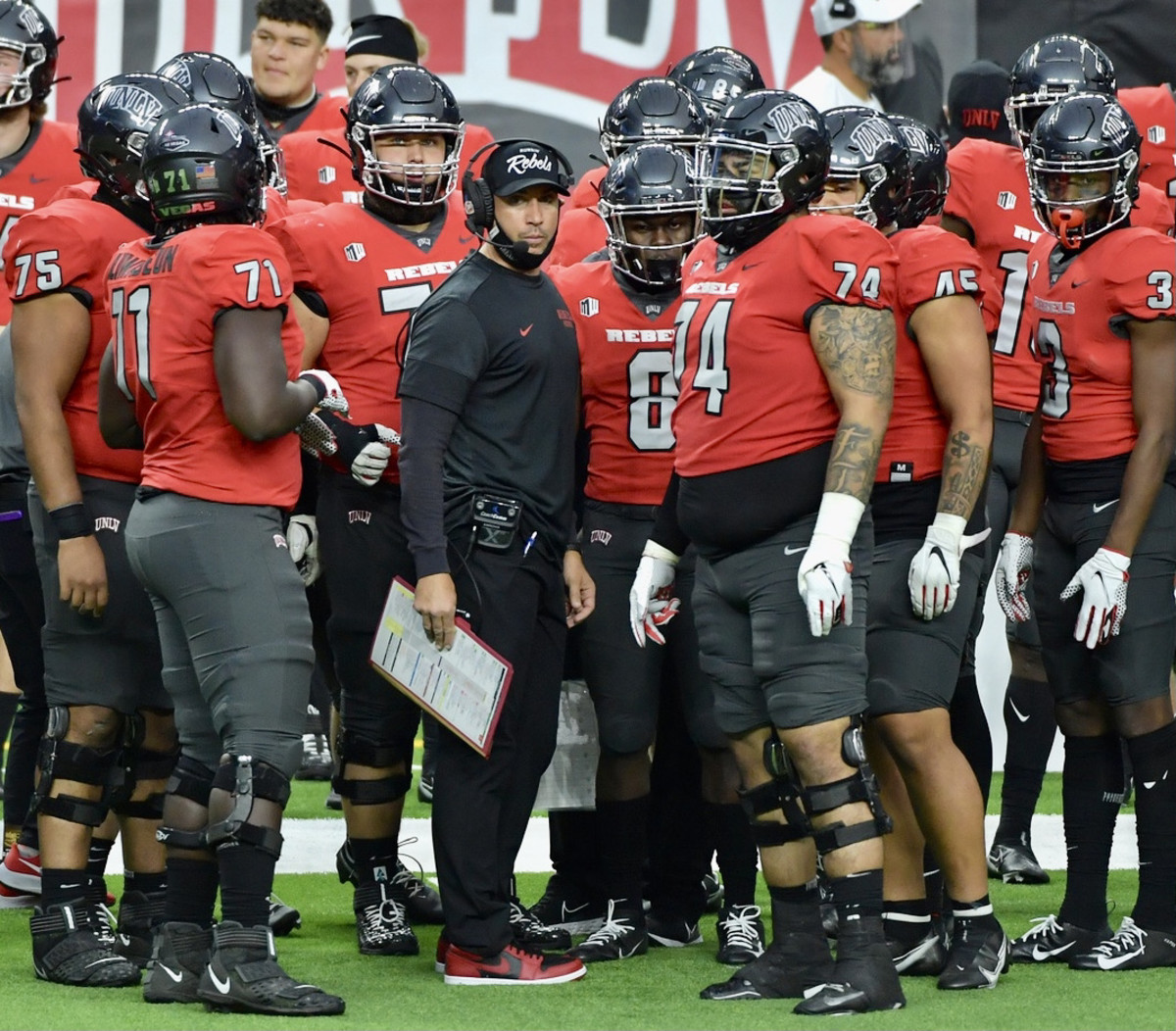 Coach Marcus Arroyo and his UNLV players