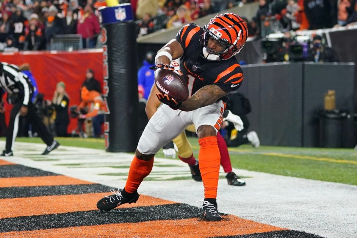 Cincinnati Bengals wide receiver Ja'Marr Chase, left, and Minnesota Vikings  wide receiver Justin Jefferson exchange autographed jerseys after an NFL  football game Sunday, Sept. 12, 2021, in Cincinnati. (AP Photo/Jeff Dean  Stock