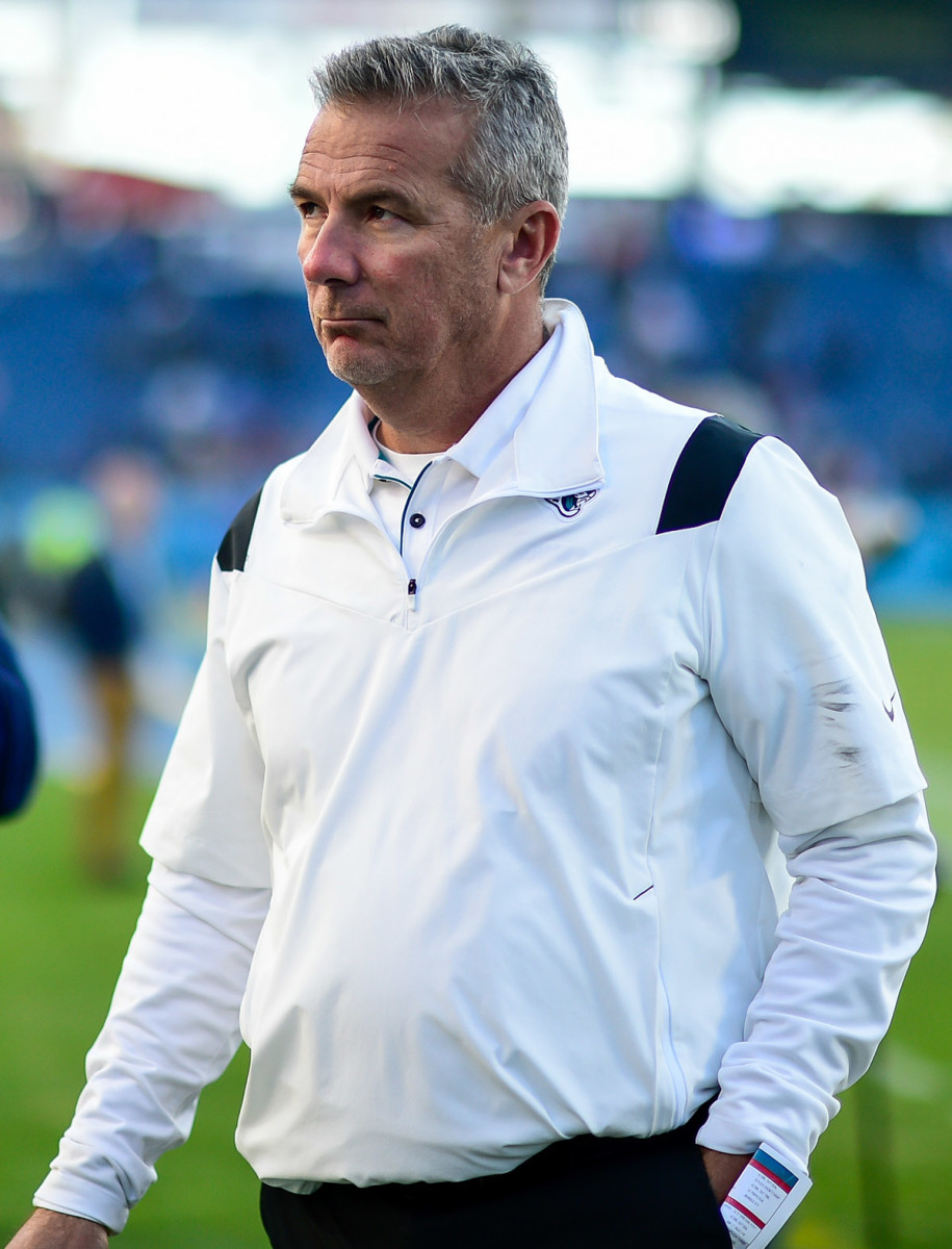 Former Jacksonville Jaguars head coach Urban Meyer walks from the field.