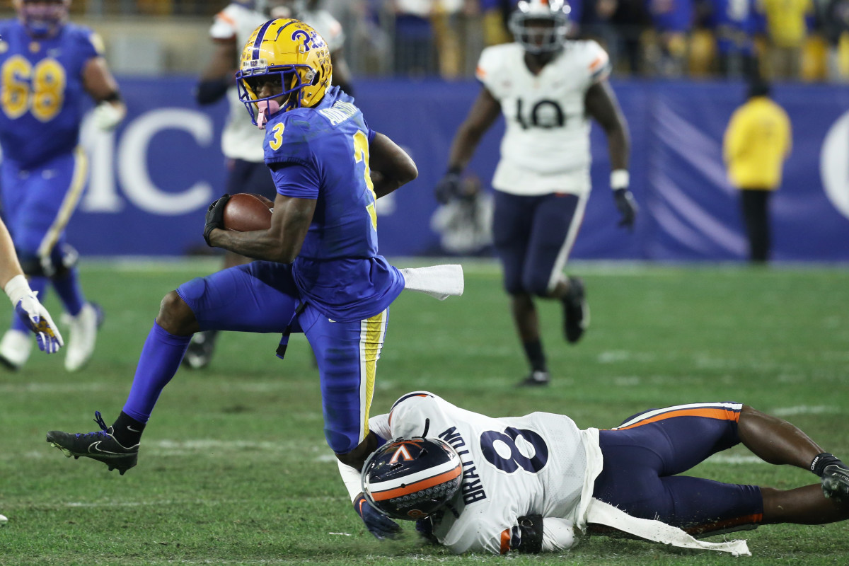 Biletnikoff Award winner Jordan Addison of Pitt slips a would-be Virginia tackler in their 48-38 win on Nov. 20.