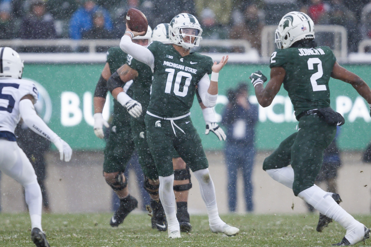 Payton Thorne attempts a pass in the snow against Penn State.