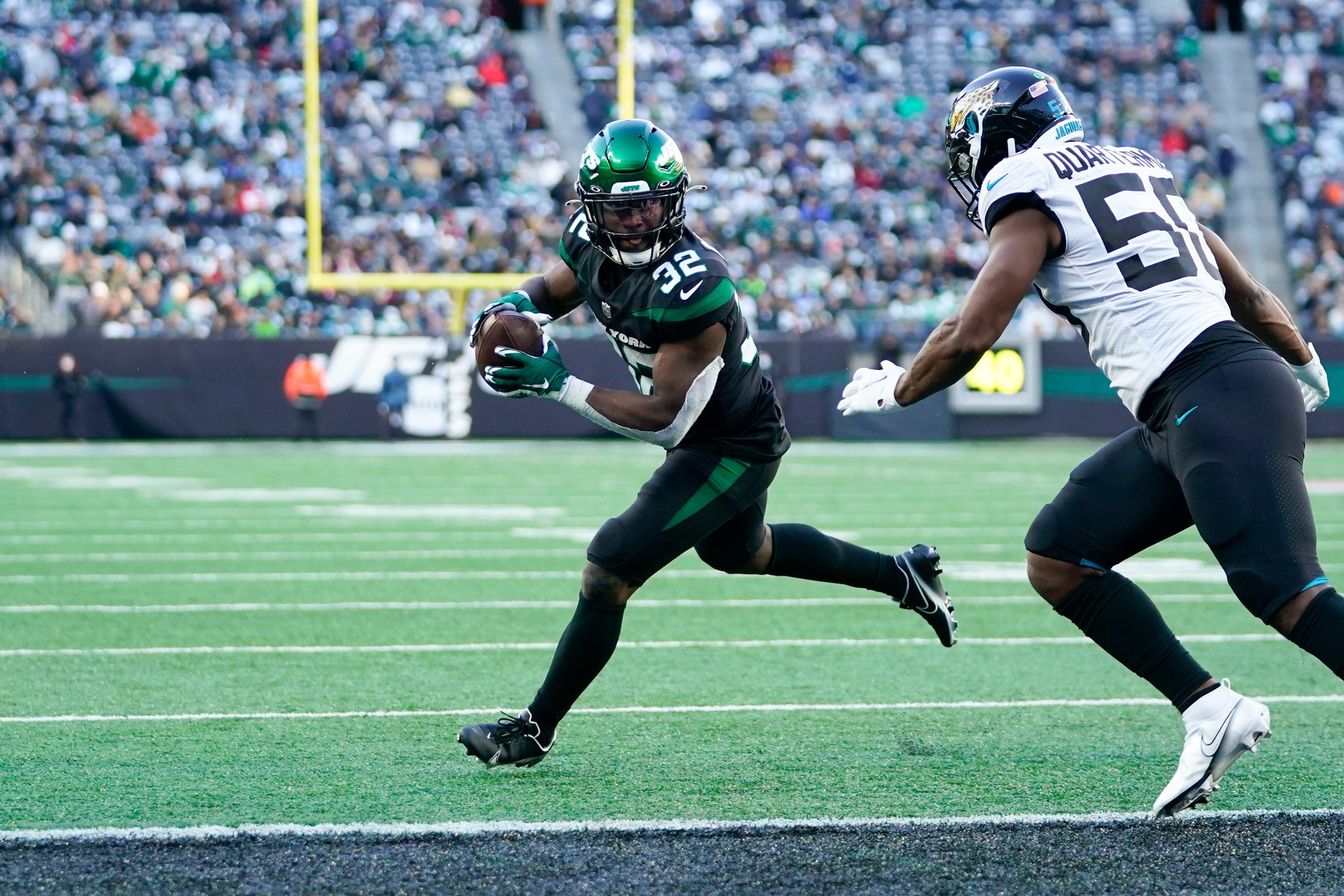 New York Jets running back Michael Carter (32) during an NFL football game  against the New York Giants, Saturday, Aug. 26, 2023 in East Rutherford,  N.J. Jets won 32-24. (AP Photo/Vera Nieuwenhuis