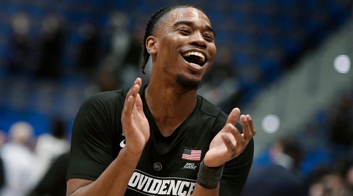 Providence's A.J. Reeves (11) celebrates his teams win at the end NCAA college basketball game against Connecticut, Saturday, Dec. 18, 2021, in Hartford, Conn.