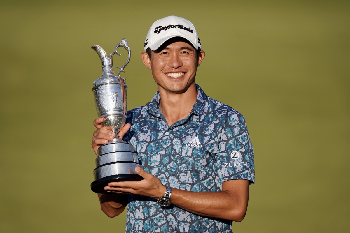 Collin Morikawa shows off the Claret Jug