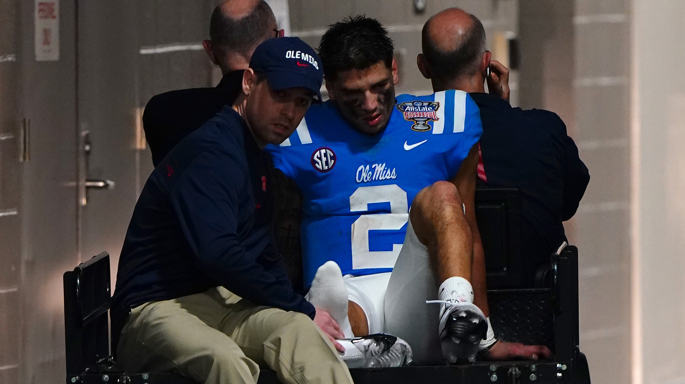 Matt Corral injury: Ole Miss quarterback carted off field after hurting leg  vs. Baylor - Sports Illustrated