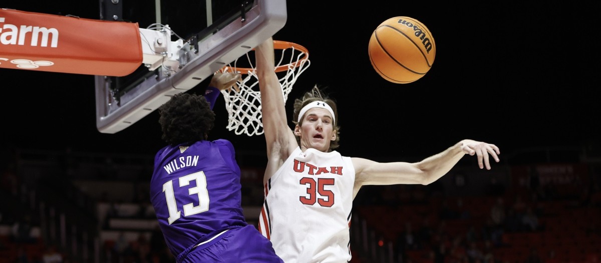 Langston Wilson and Branden Carlson battle inside on Thursday night.