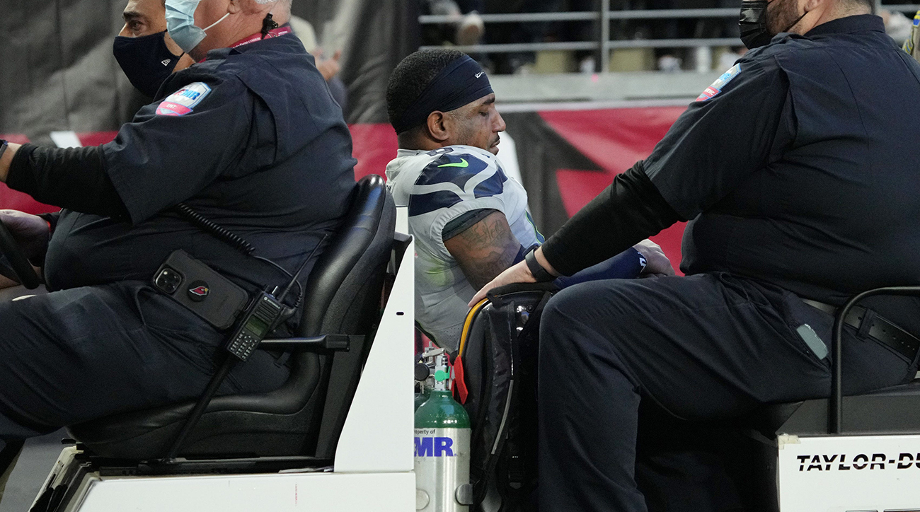 Seahawks' Diggs carted off with dislocated ankle, broken fibula