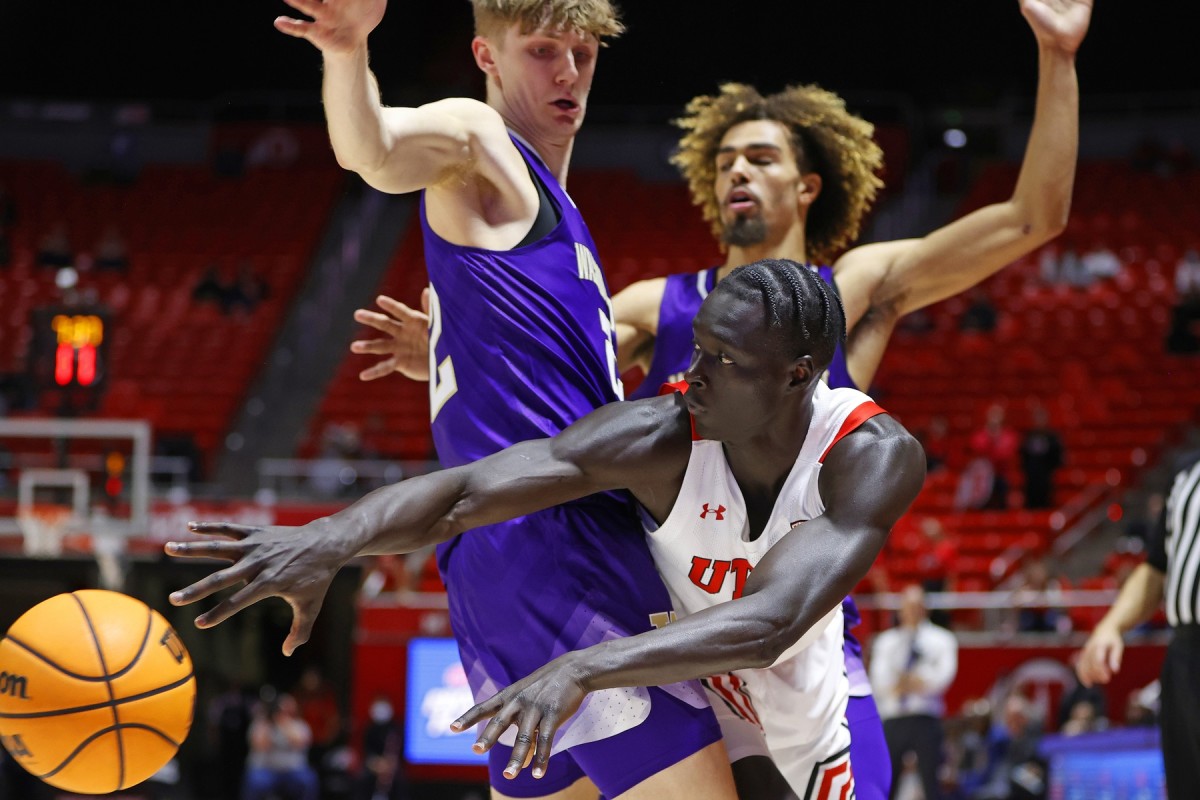 Cole Bajema plays defense at Utah.