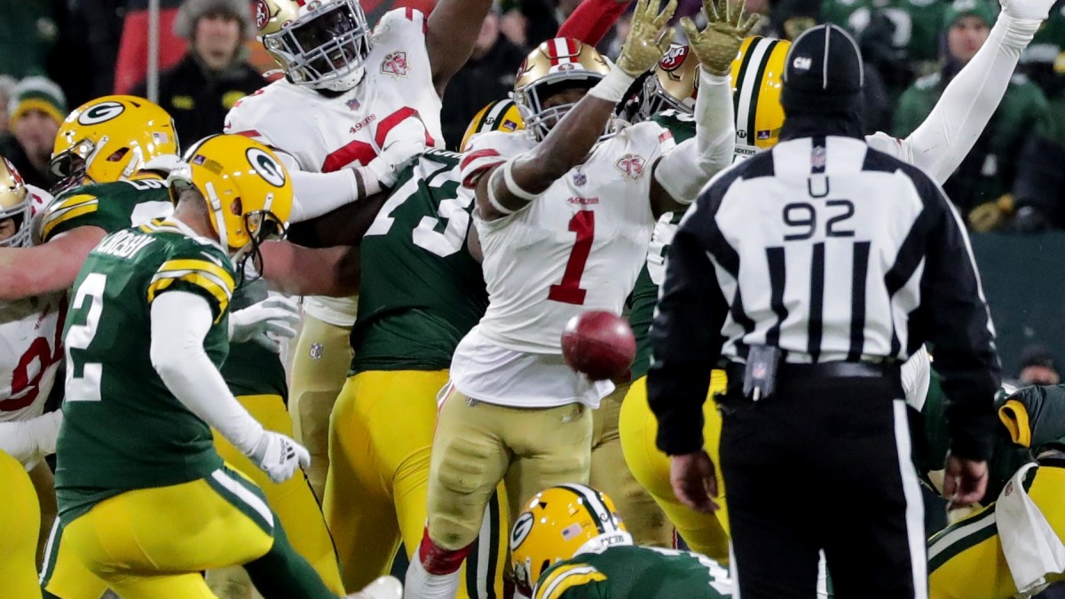 The 49ers block the punt and Hufanga picks it up for a touchdown to tie the  game against the Packers : r/sports