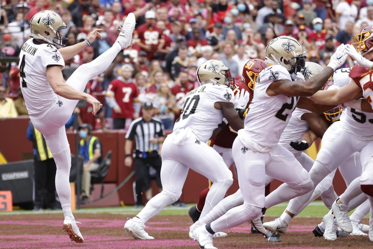 New Orleans Saints punter Blake Gillikin (4) punts the ball against Washington. Mandatory Credit: Geoff Burke-USA TODAY 