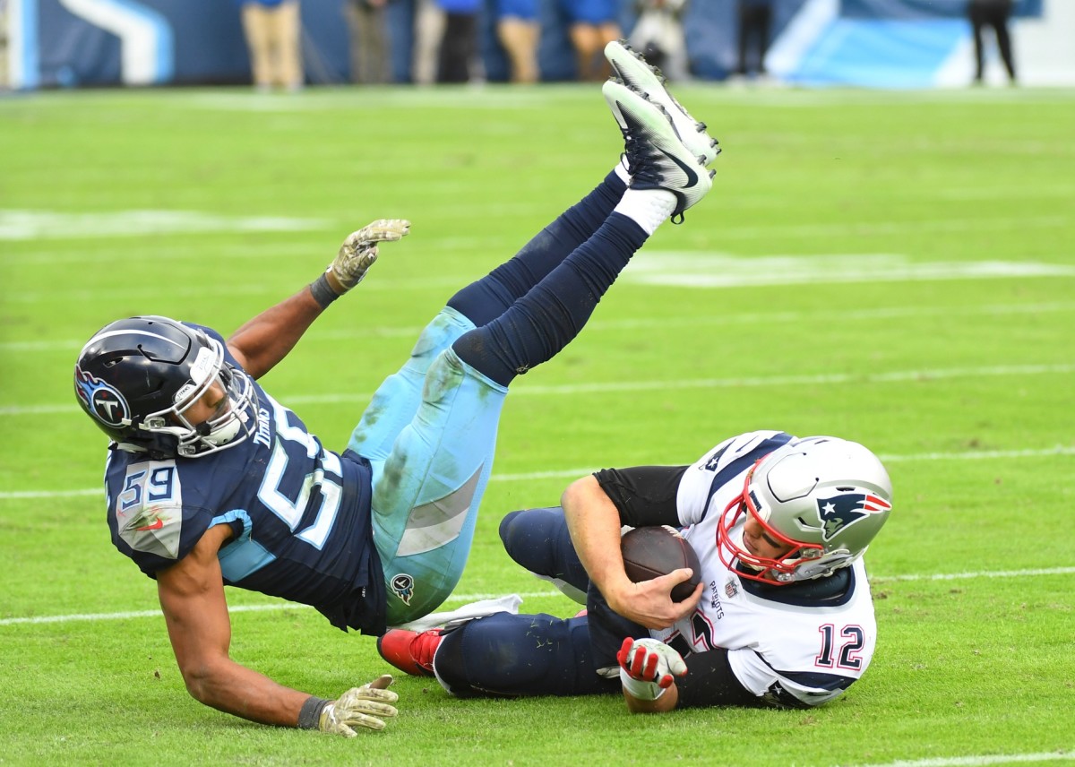 Watch: Tom Brady Annihilate Tennessee Titans With 5 TDs in 10 Minutes  Brandishing the Patriots Red Jersey to the NFL - EssentiallySports