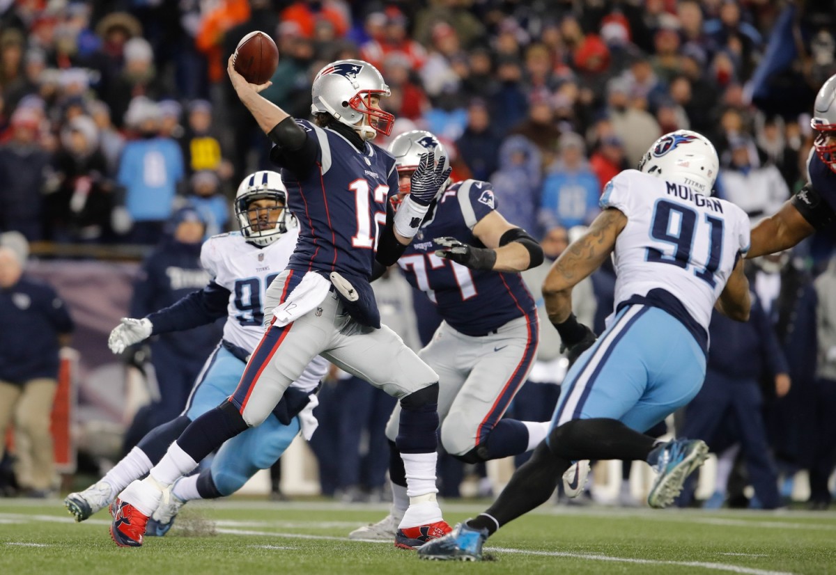 18 October 2009. Patriot Quarterback Tom Brady (12) in the first quarter of  a record setting game. The New England (Boston) Patriots defeated the  Tennessee (Oilers) Titans 59 to 0 in a