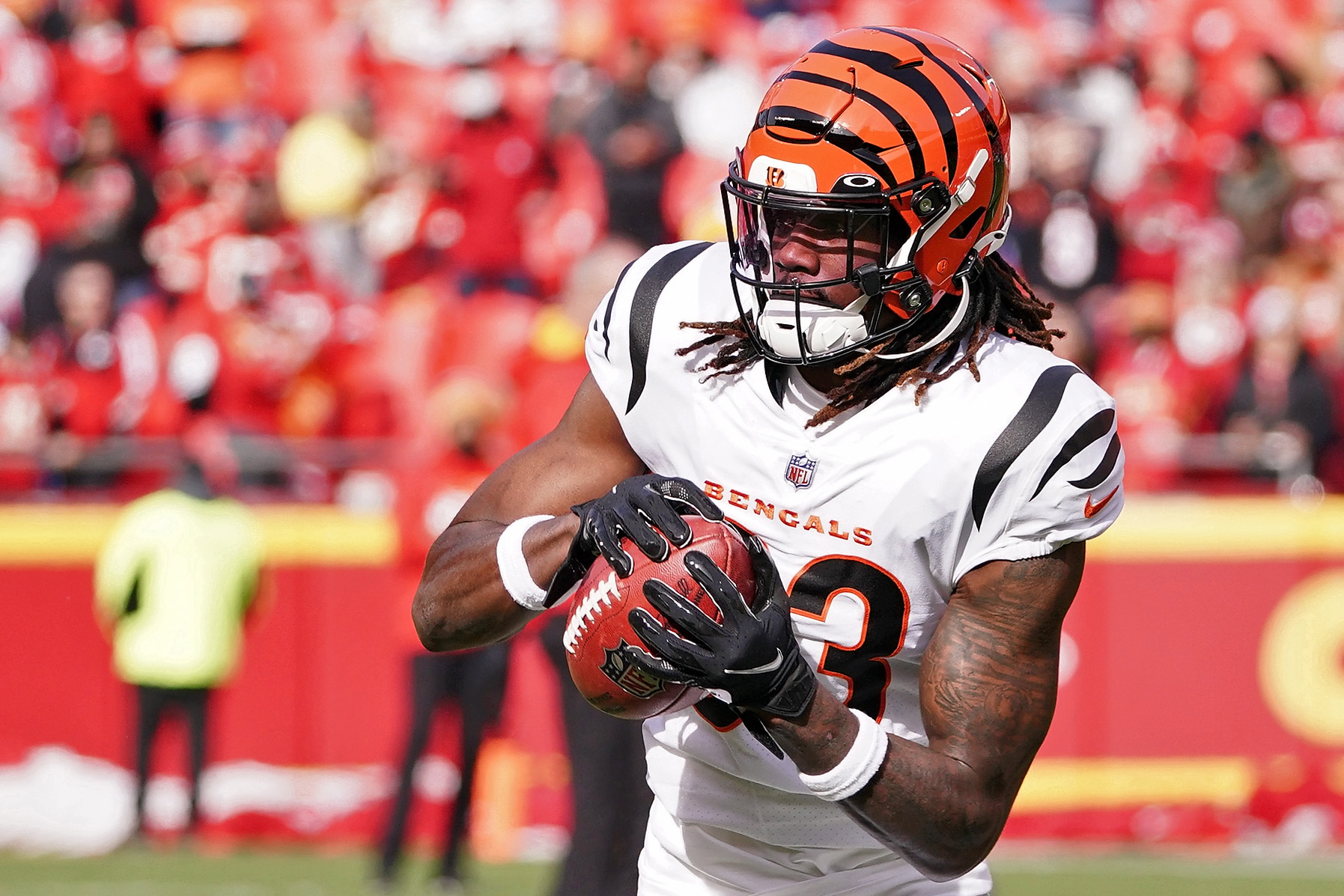 Cincinnati Bengals cornerback Tre Flowers (33) runs for the play