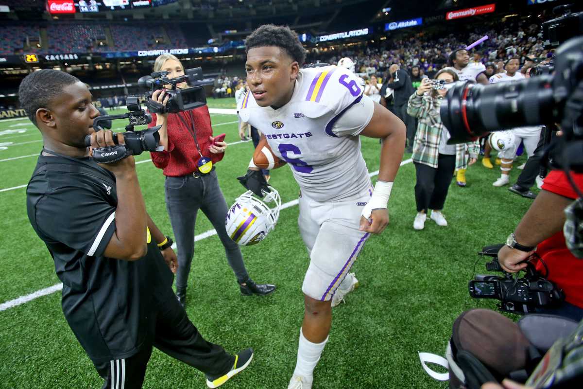 Westgate tight end Danny Lewis, Jr. runs out to accept the Outstanding Player Award after the Class 4A State Championship game between Westgate and Warren Easton at the Caesar Superdome on Friday, December 10, 2021.