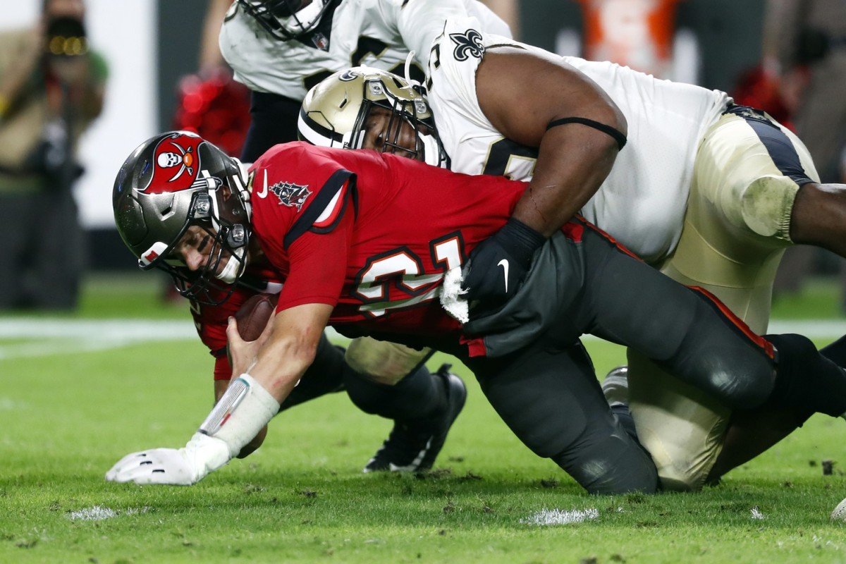 New Orleans Saints defensive tackle David Onyemata (93) sacks Tampa Bay quarterback Tom Brady (12). Mandatory Credit: Kim Klement-USA TODAY Sports