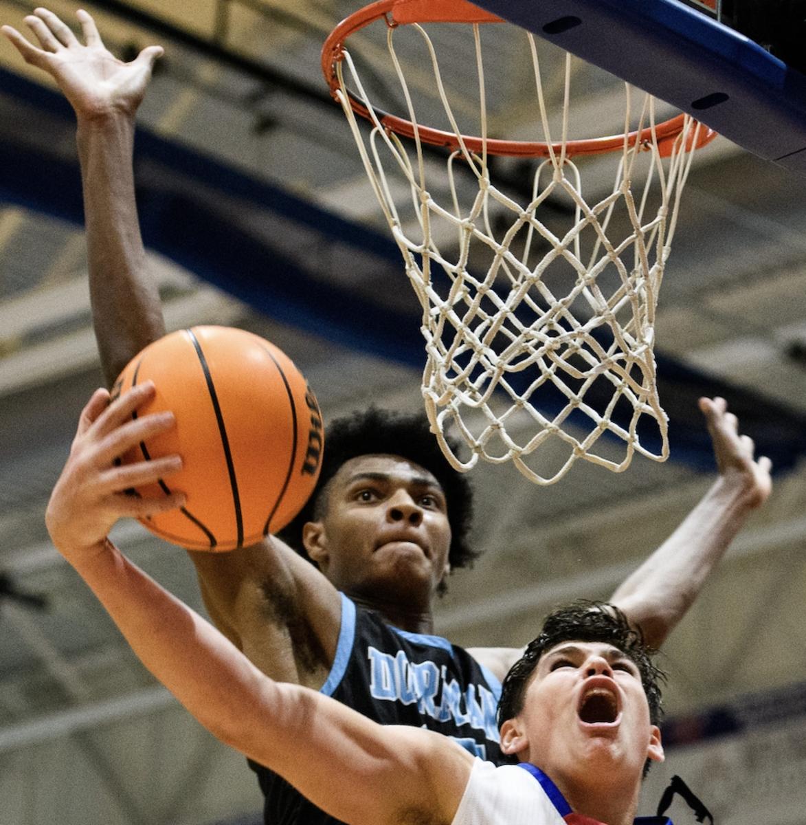 Riverside's Julen Iturbe (32) attempts to score a layup as Dorman's Noah Clowney (15) defends during their game Friday, Feb. 4, 2022.