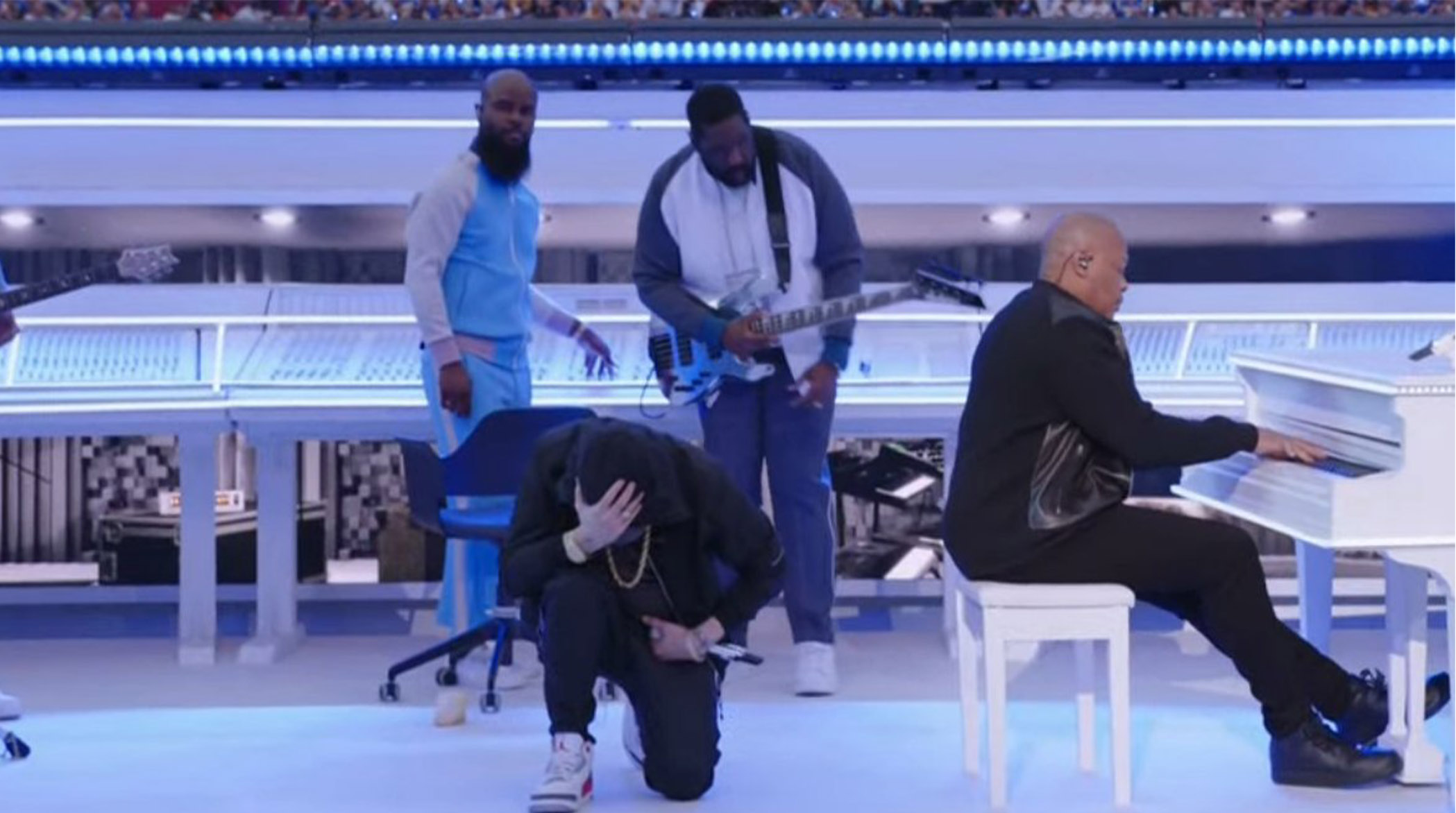 Eminem kneels during Super Bowl 2022 halftime show