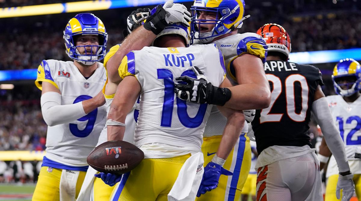 Los Angeles Rams wide receiver Cooper Kupp (10) is congratulated by teammates after scoring a touchdown against the Cincinnati Bengals during the second half of the NFL Super Bowl 56 football game Sunday, Feb. 13, 2022, in Inglewood, Calif.