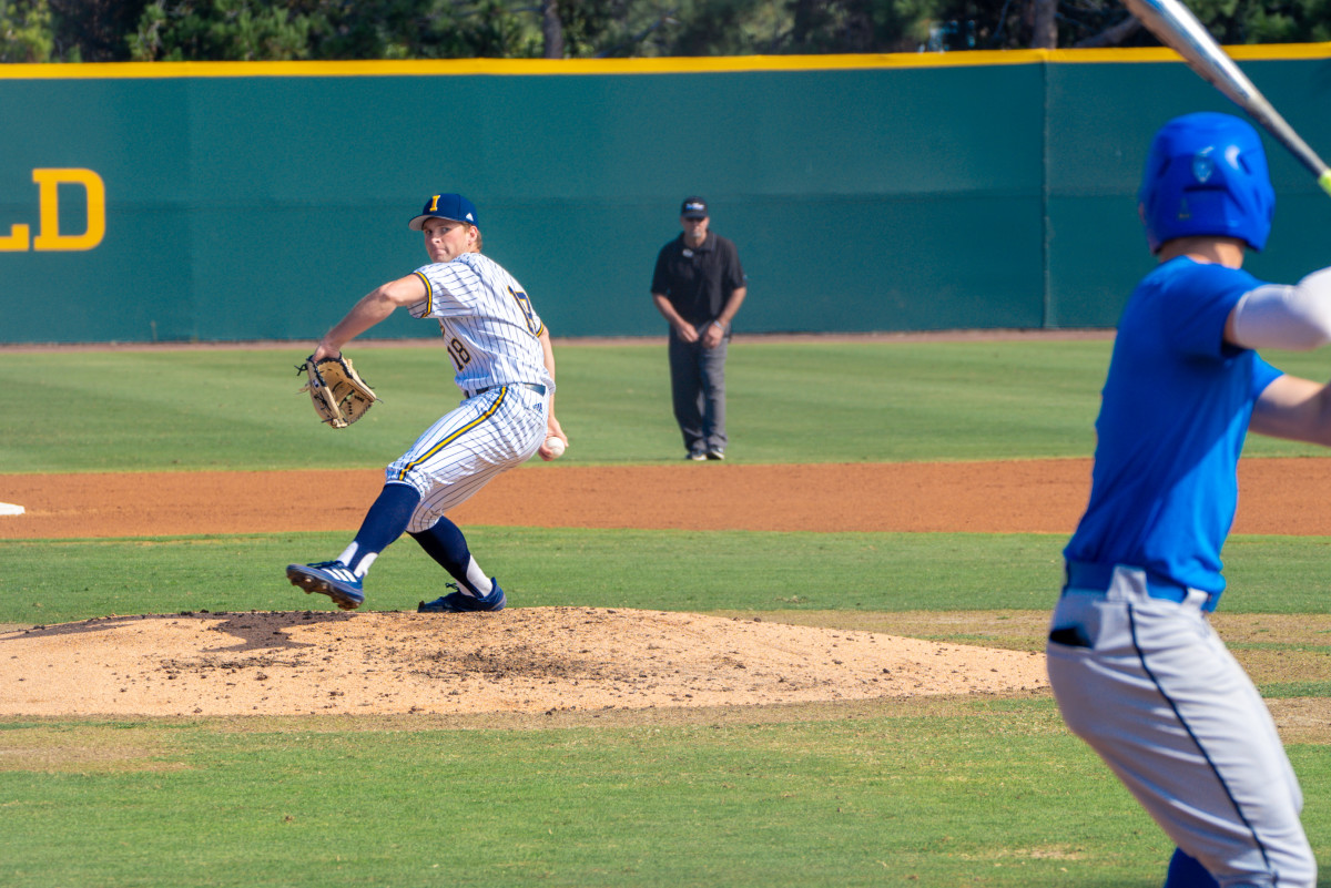 Freshman Finnegan Wall throws a pitch against UCLA in UC Irving's fall season.