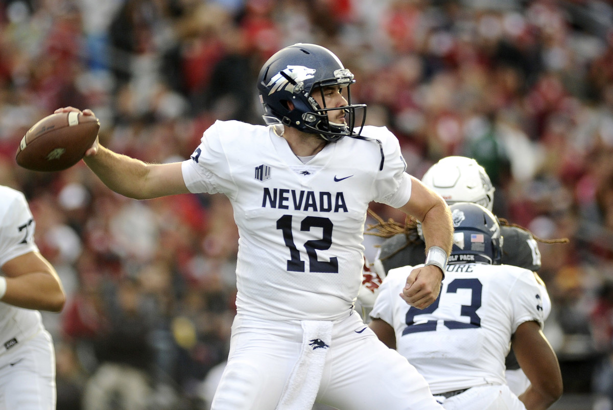 Nevada Wolf Pack quarterback David Cornwell (12) drops back for a pass against the Washington State Cougars during the second half at Martin Stadium.