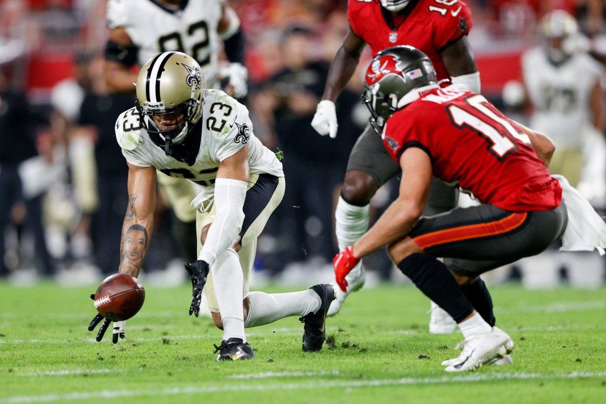 New Orleans Saints cornerback Marshon Lattimore (23) recovers a fumble against the Tampa Bay Buccaneers. Mandatory Credit: Nathan Ray Seebeck-USA TODAY Sports