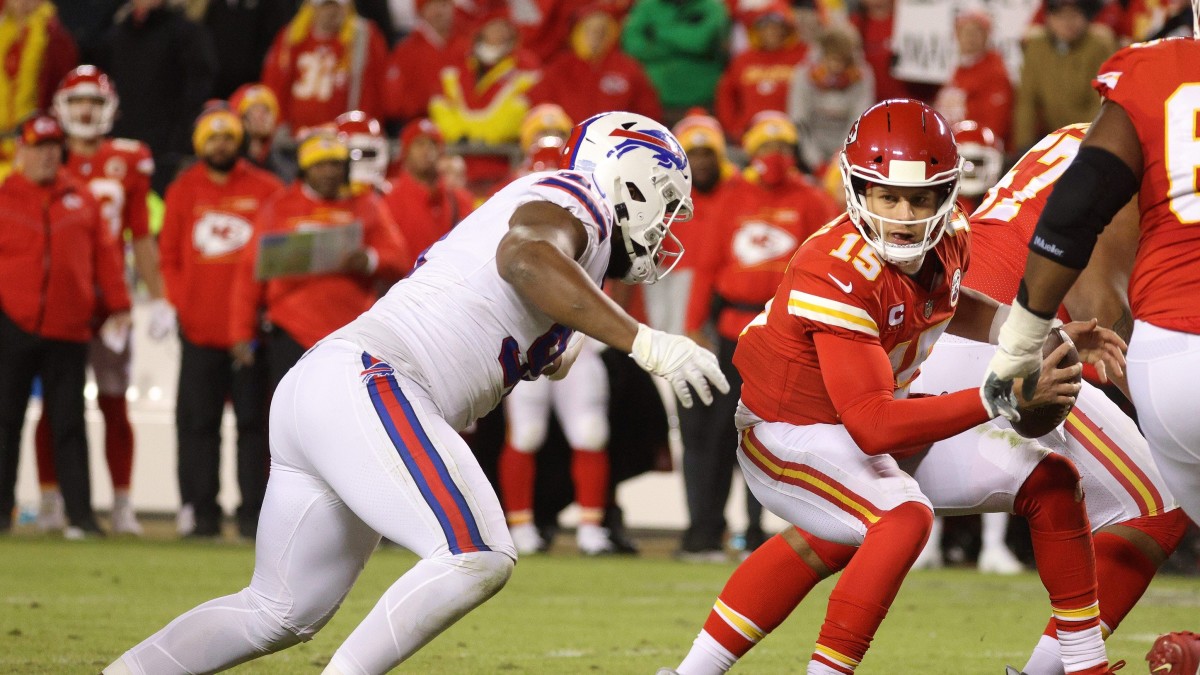 Mahomes attempts to evade pressure from a Bills' defensive lineman.