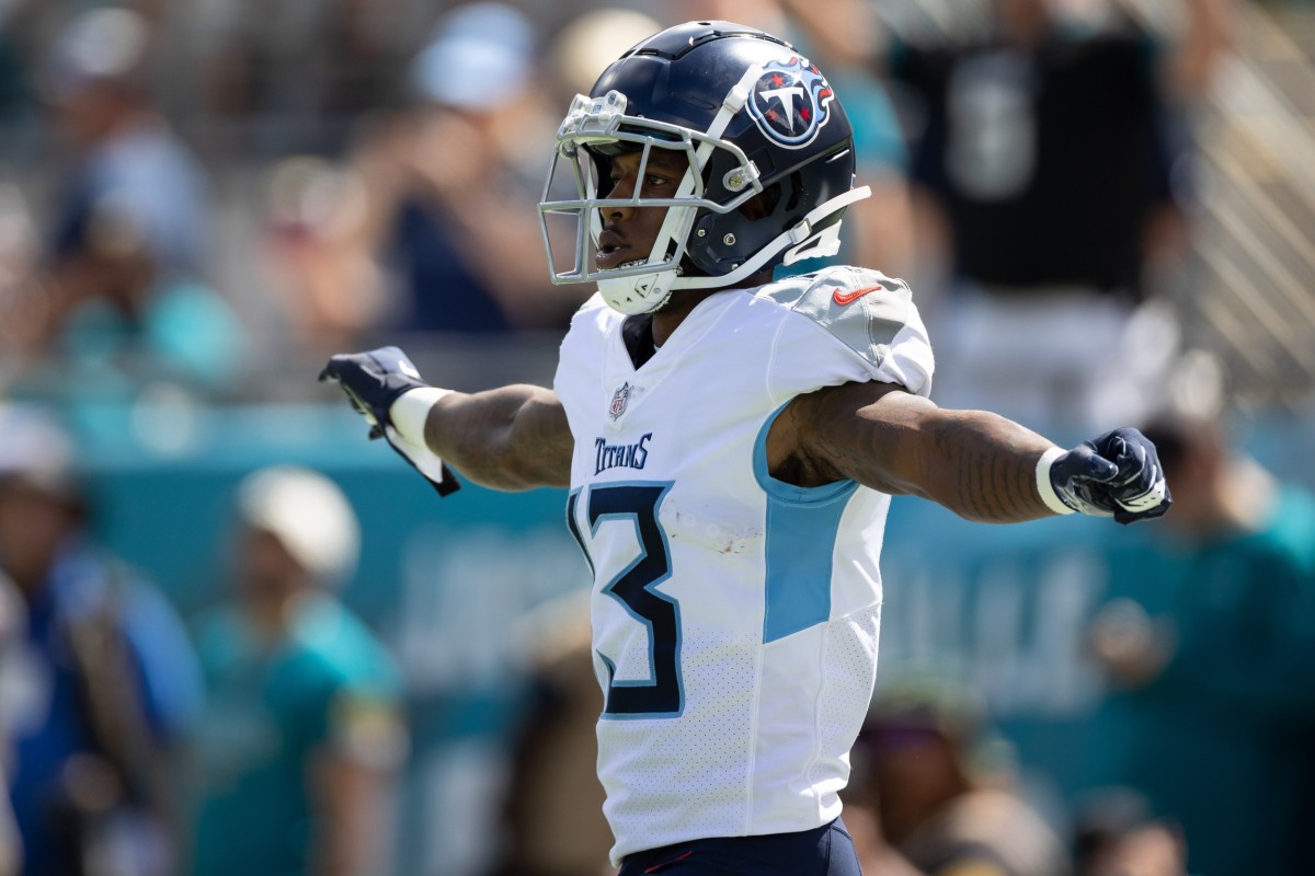 Tennessee Titans wide receiver Cameron Batson (13) gestures during a kickoff during the first half against the Jacksonville Jaguars at TIAA Bank Field.