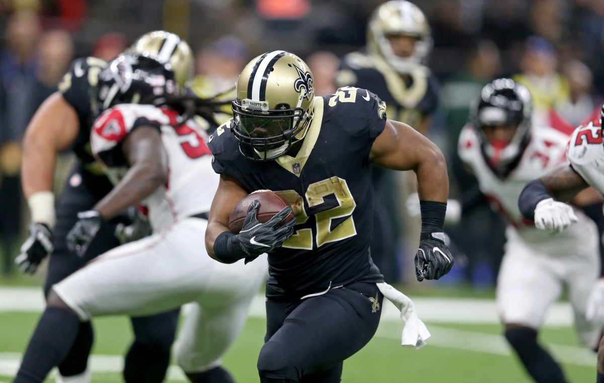 Dec 24, 2017; New Orleans Saints RB Mark Ingram (22) runs for a touchdown against the Atlanta Falcons. Mandatory Credit: Chuck Cook-USA TODAY Sports