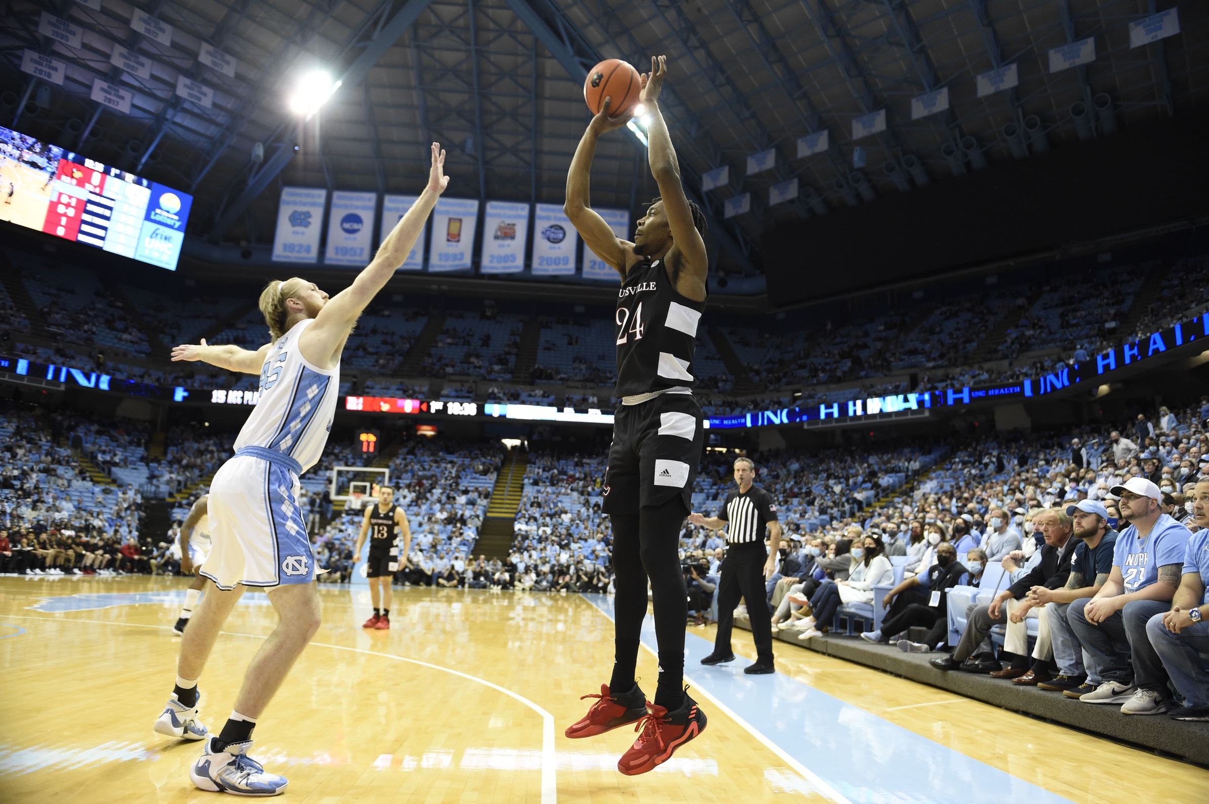 Louisville-Virginia Tech men's basketball game turns ugly as dog