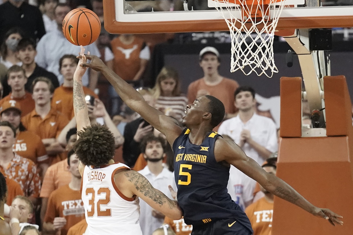 Spread & Over/Under Predictions for WVU vs Texas Sports Illustrated