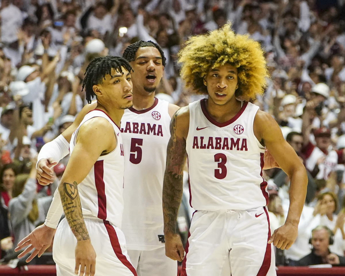 Alabama Crimson Tide guard Jahvon Quinerly (13) guard Jaden Shackelford (5) and guard JD Davison (3) celebrate after defeating the Baylor Bears at Coleman Coliseum.