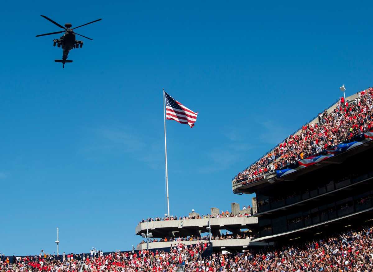 A helicopter flies over before the game at Jordan-Hare Stadium in Auburn, Ala., on Saturday, Oct. 9, 2021. Georgia Bulldogs lead the Auburn Tigers 17-3 at halftime.