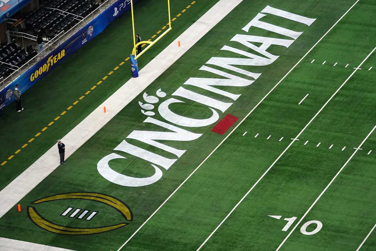 The Cincinnati Bearcats logo featured in the middle of the field ahead of the College Football Playoff semifinal game between the Alabama Crimson Tide and the Cincinnati Bearcats at the 86th Cotton Bowl Classic, Friday, Dec. 31, 2021, at AT&T Stadium in Arlington, Texas.