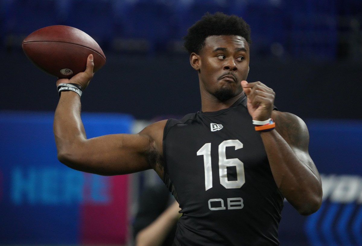 Liberty quarterback Malik Willis (QB16) goes through drills during the 2022 NFL Scouting Combine at Lucas Oil Stadium.