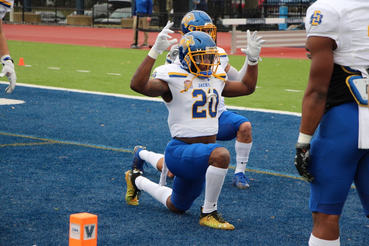 Pierre Strong stretches before the Jacks' FCS playoff game at Villanova.