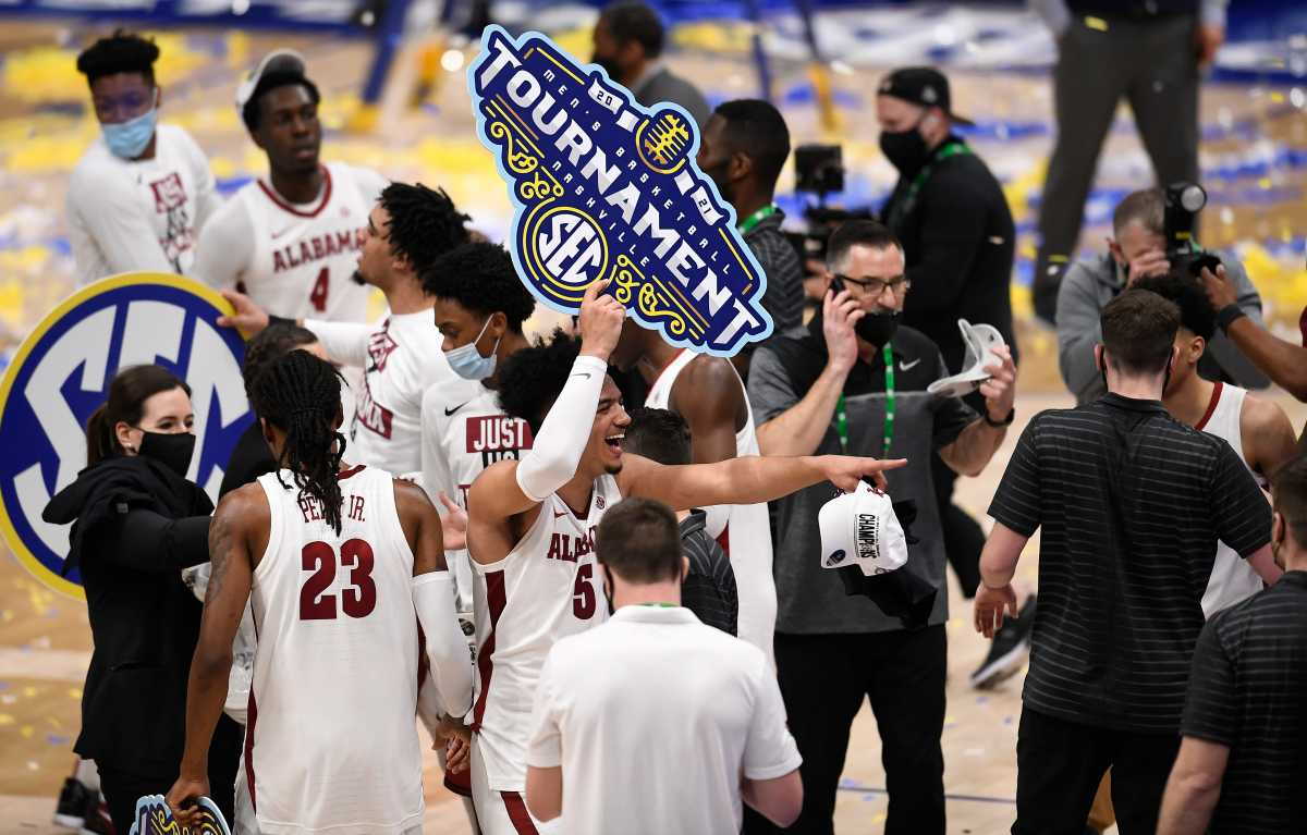 Alabama celebrates their 80 to 79 win against LSU in the SEC Men's Basketball Tournament Championship game at Bridgestone Arena Sunday, March 14, 2021 in Nashville, Tenn. Nas Sec Lsu Ala 05