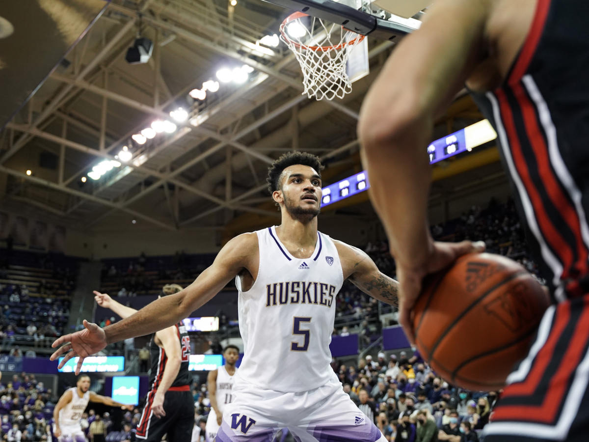 Jamal Bey defends on the inbound pass.